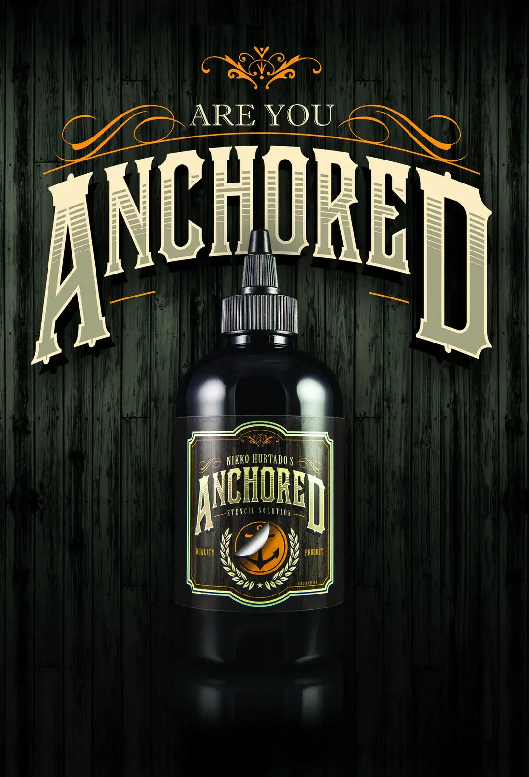 Black bottle of nikko hurtados anchored stencil solution 240ml with gold laurel wreath and anchor label and screw cap