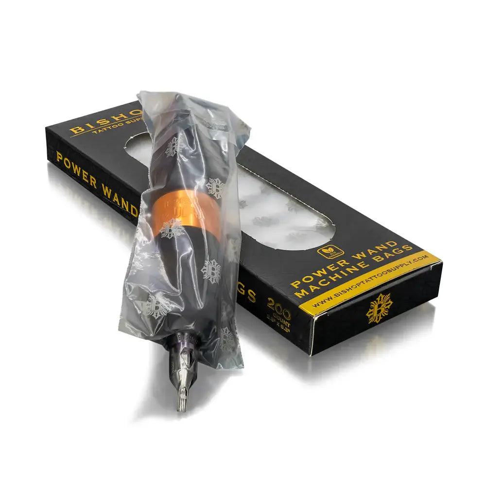 Black and orange bishop battery pen machine with metallic tip wrapped in clear plastic for tattoo use