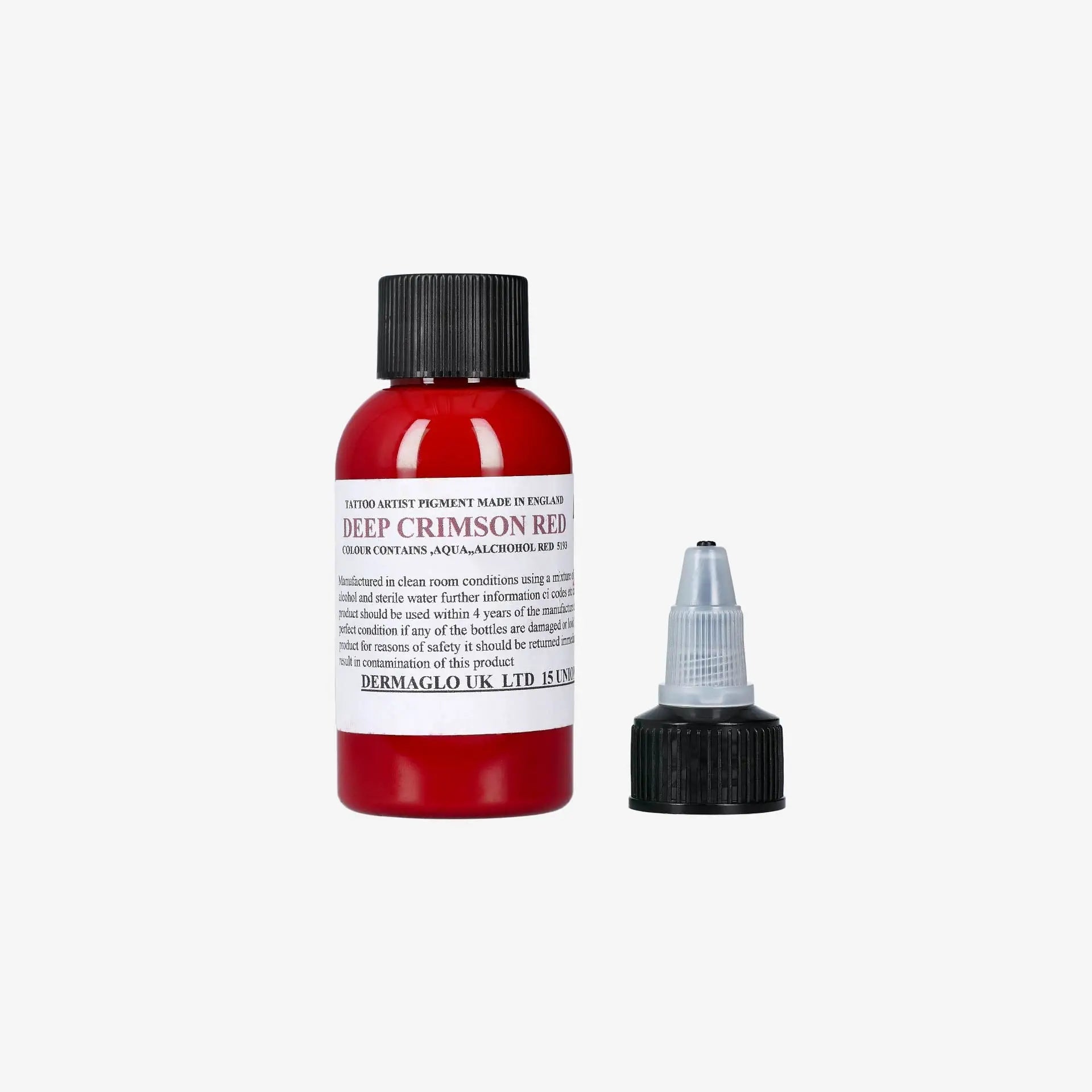 A vibrant red tattoo pigment bottle labeled deep crimson red by dermaglo uk ltd in the dermaGlo product line