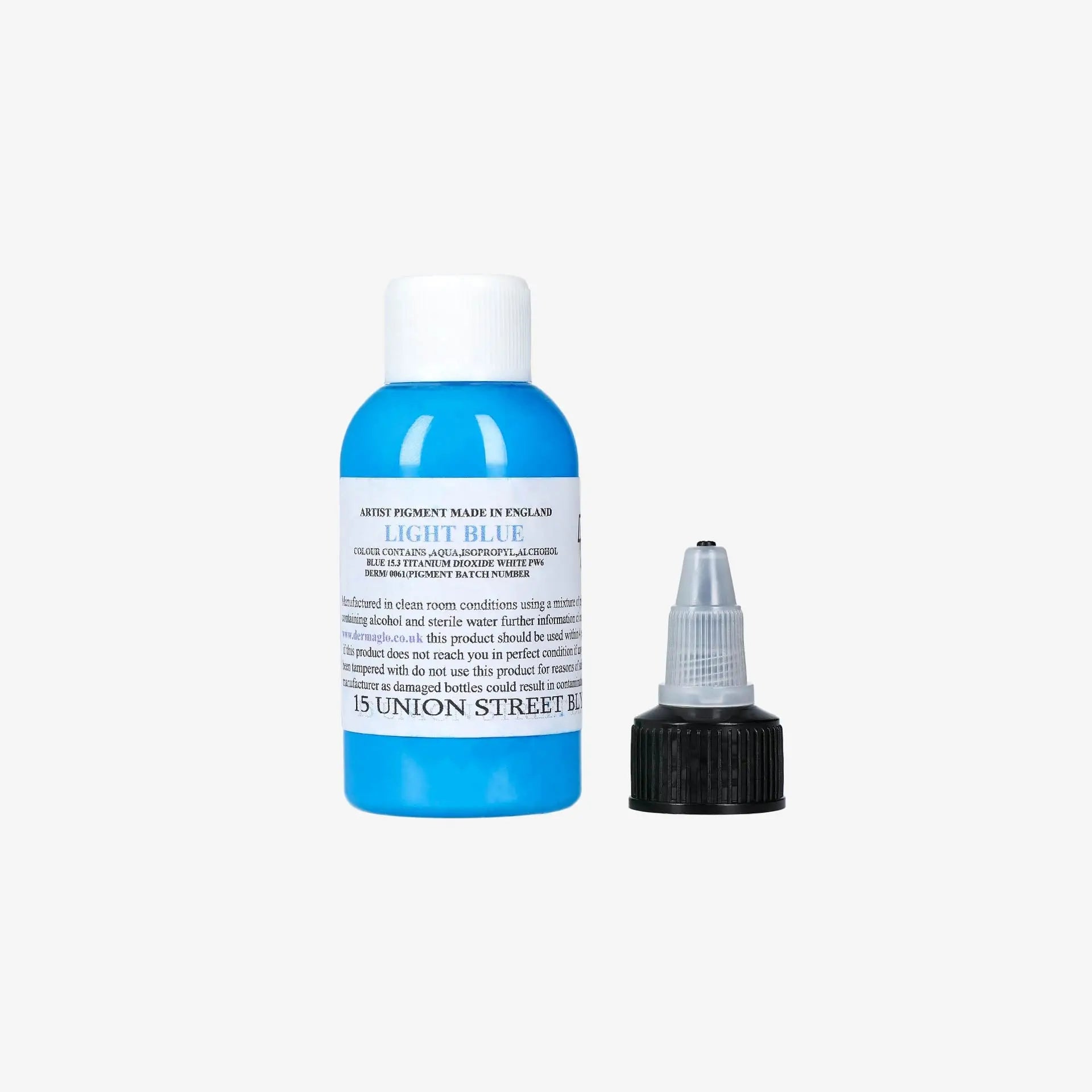 A vibrant light blue artist pigment bottle with white cap and black dropper labeled light blue by 15 Union Street from Dermaglo