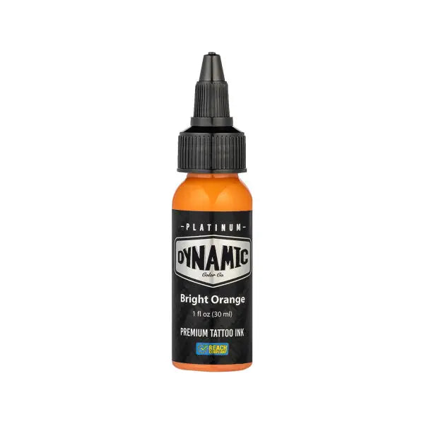 Bright orange plastic bottle of Dynamic tattoo ink with black cap and label from the Platinum Fire set 5x30 ml