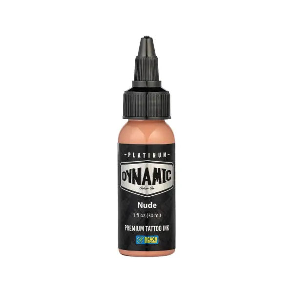 A sleek black-topped bottle of dynamic tattoo ink in nude shade with glossy peach liquid and bold white branding