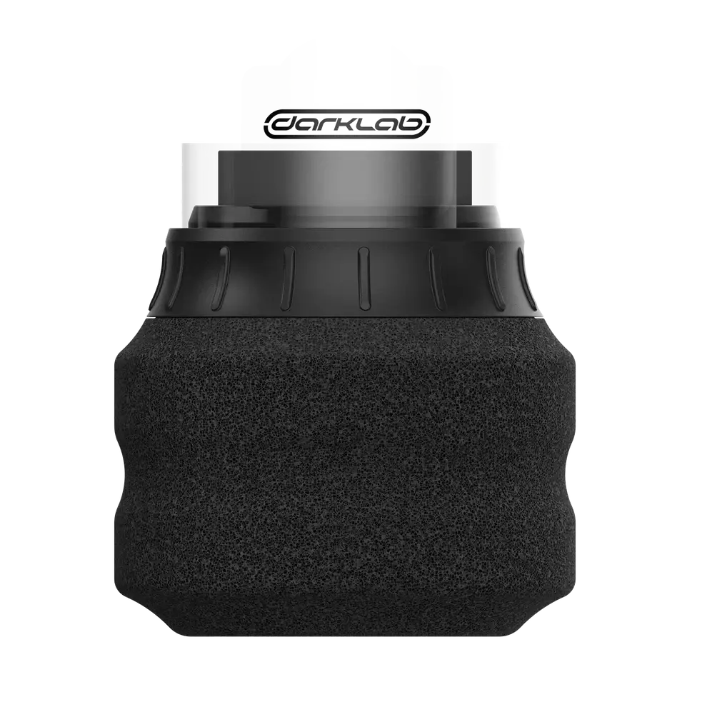 Fk irons ergo shield disposable foam tattoo grips in black shown on a darklab rollerball with a white cap and black ring