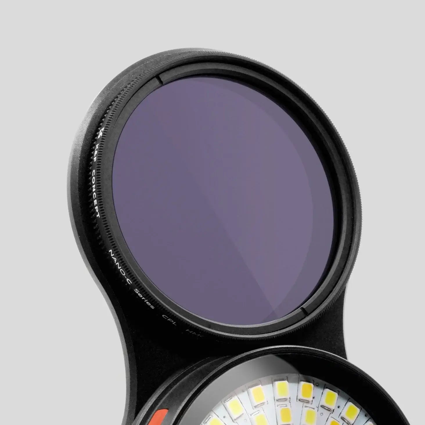 Black circular camera lens filter with purple tint and engraved text for GOAT G8 V2 combo photography use