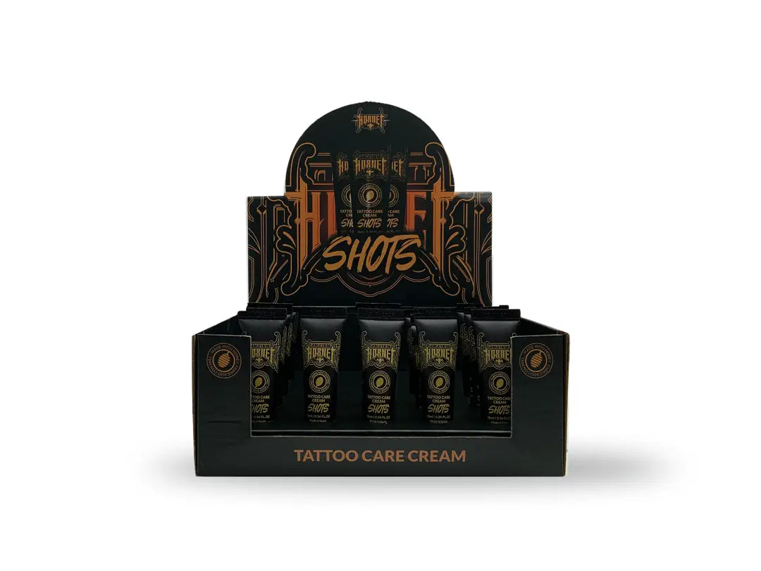 Black and gold ornate hull shots display box for hornet tattoo care cream 25 x 10 ml packaging