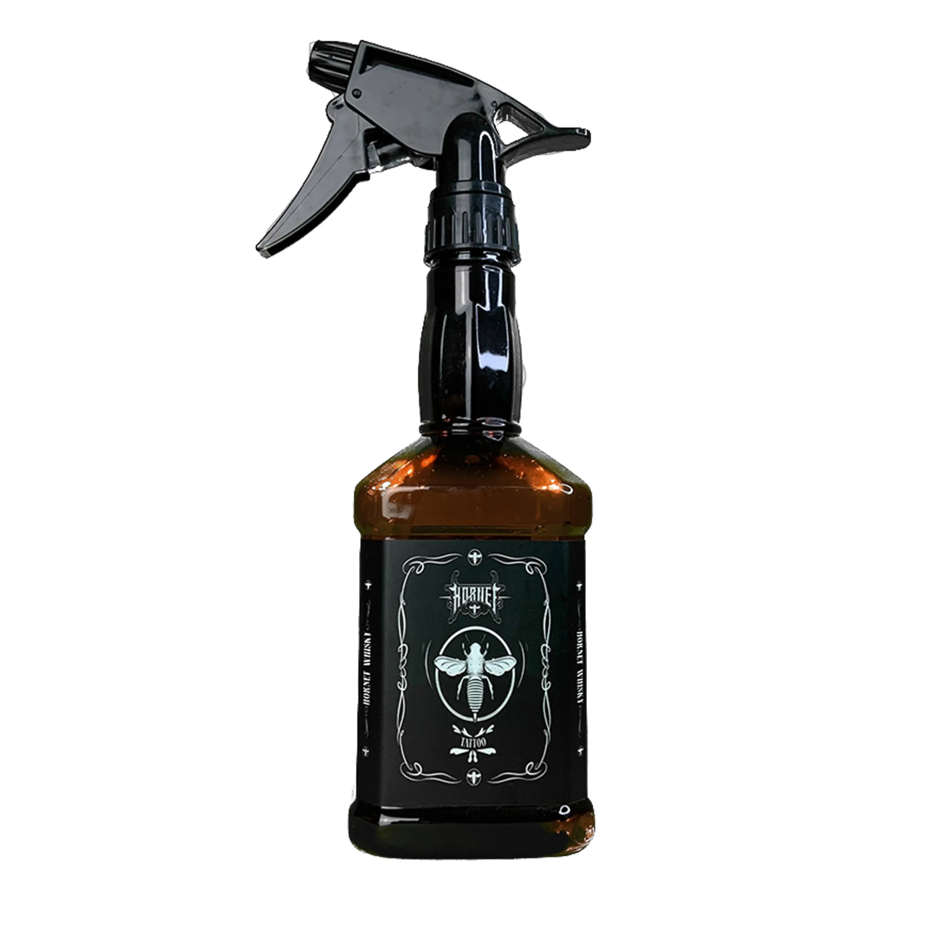 Black spray bottle hornet water sprayer with amber glass body black trigger nozzle and ornate label with white bee emblem