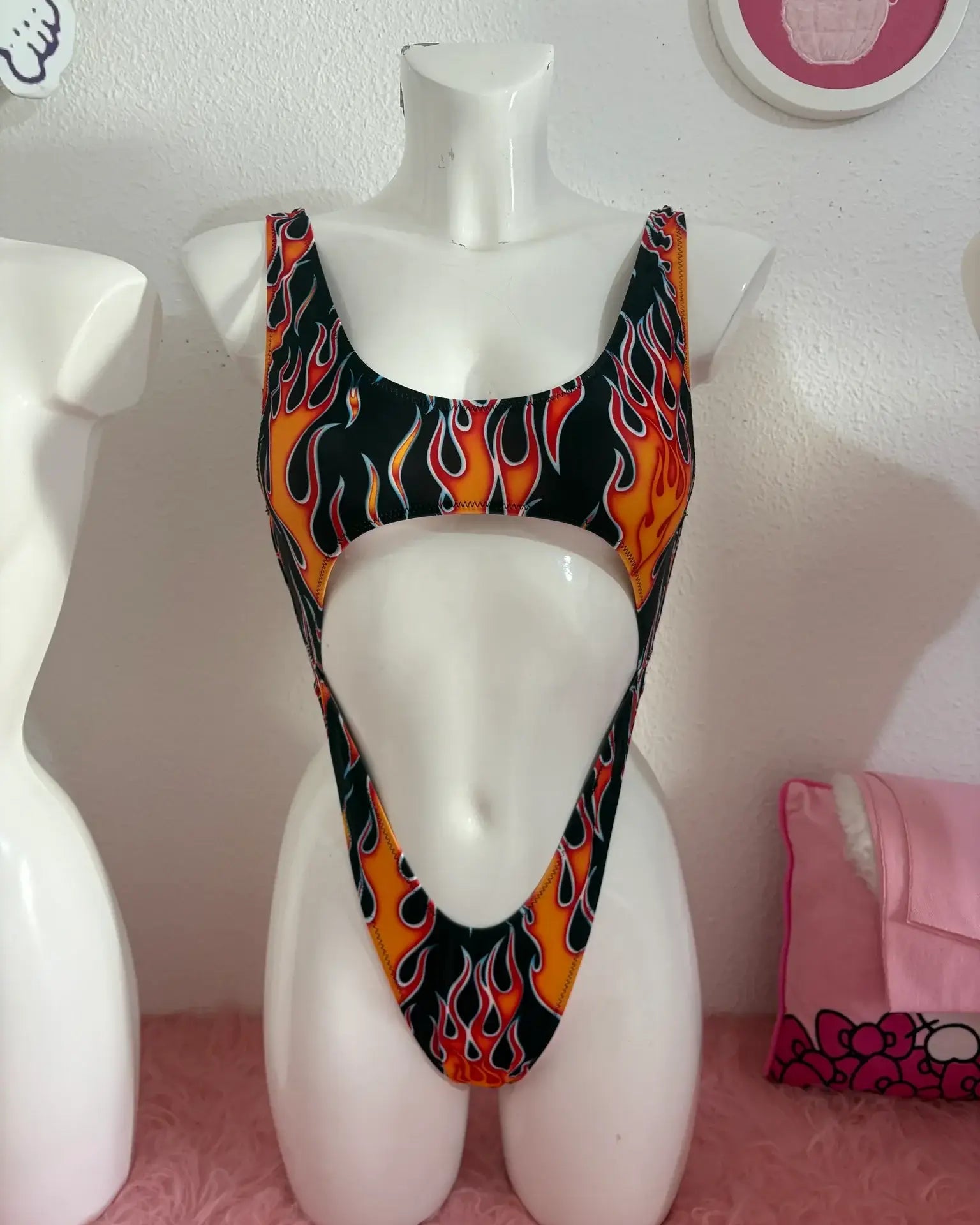 Kalu ibiza flames trikini in black orange and red features a vibrant flame pattern and bold cutout design with vice attitude