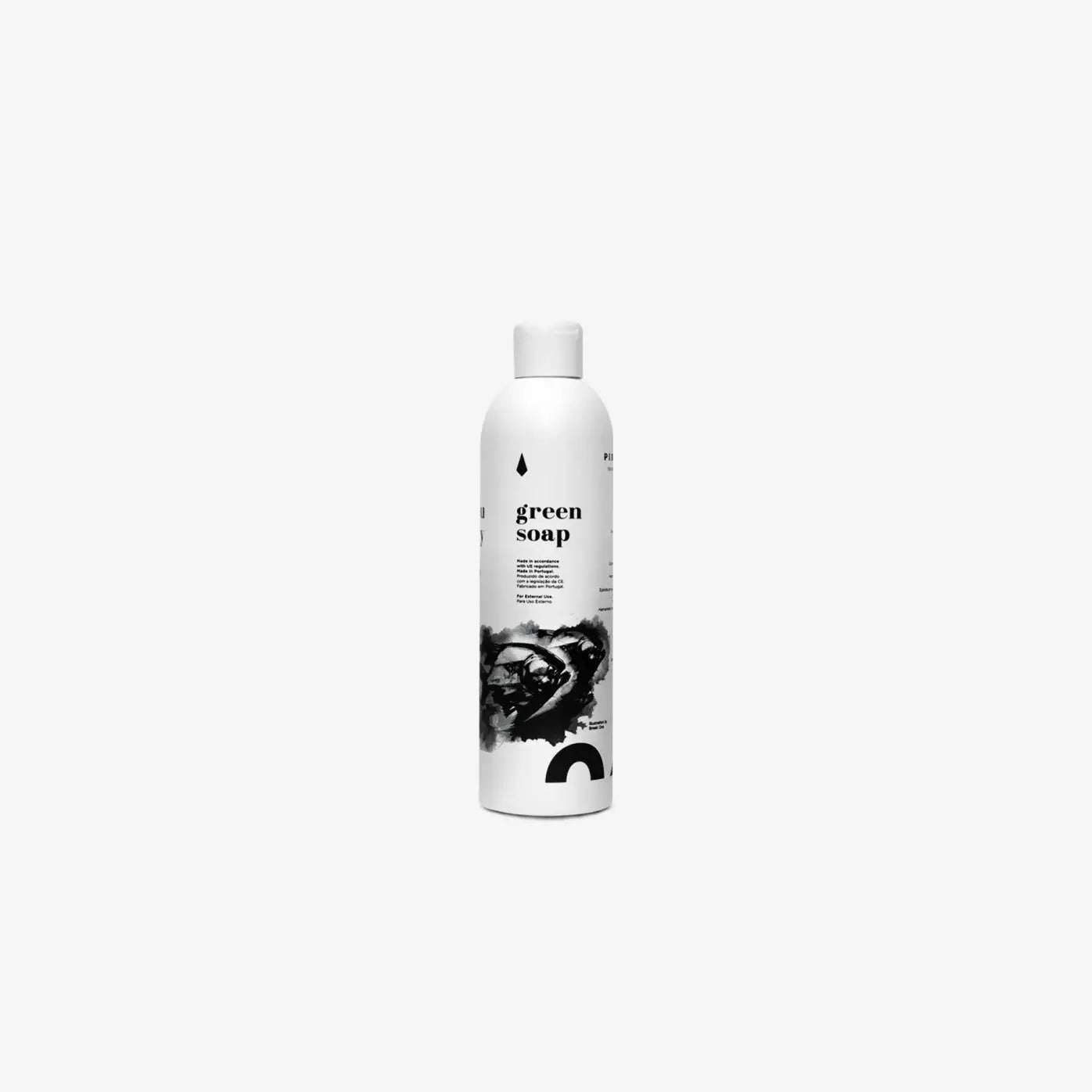 White cylindrical bottle of piranha green soap menta with minimalist black label and white cap 1l