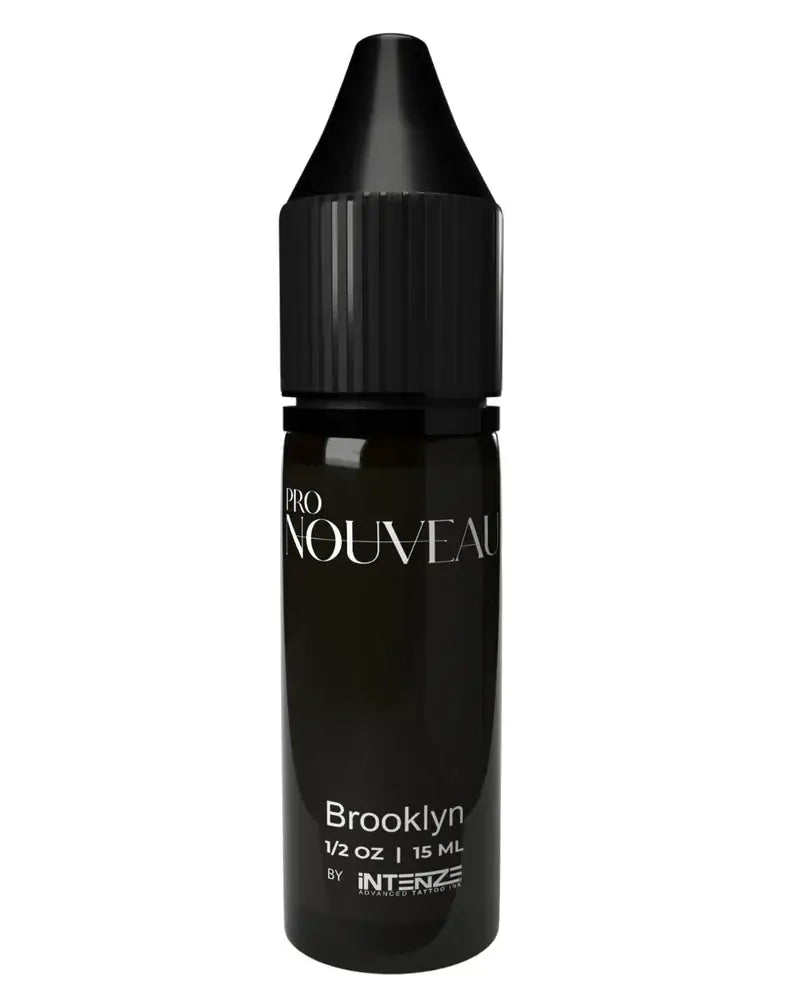 Black glass bottle with ribbed cap labeled pro nouveau brooklyn 15 ml pmu pigment from brows collection