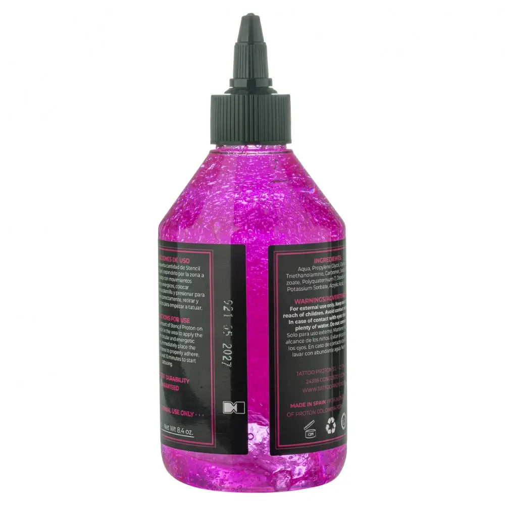 A vibrant pink translucent gel-filled bottle of proton professional stencil primer with a black screw-on cap 250ml