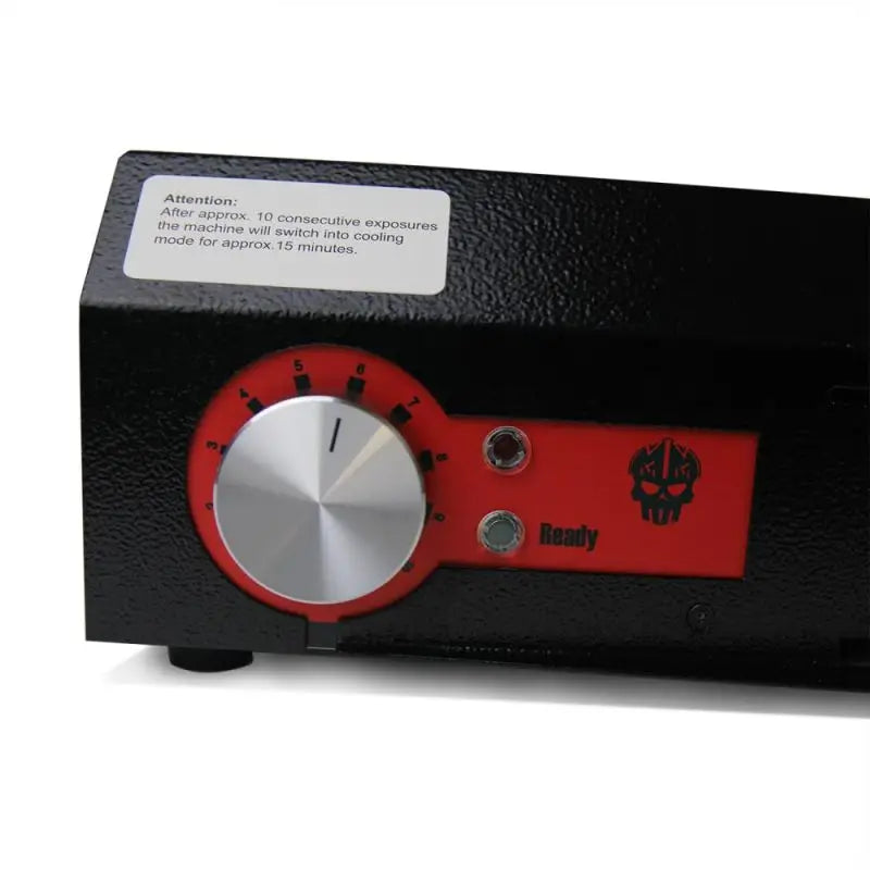 Black textured thermal imager v2 with red and silver control dial, two metallic buttons, and skull logo on the side