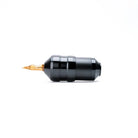 Acus C2 black tattoo machine with gold-colored needle tip designed for precision tattooing