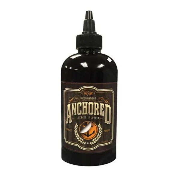 Black plastic bottle of anchored stencil solution 240ml with black cap and gold lettering orange pumpkin design label