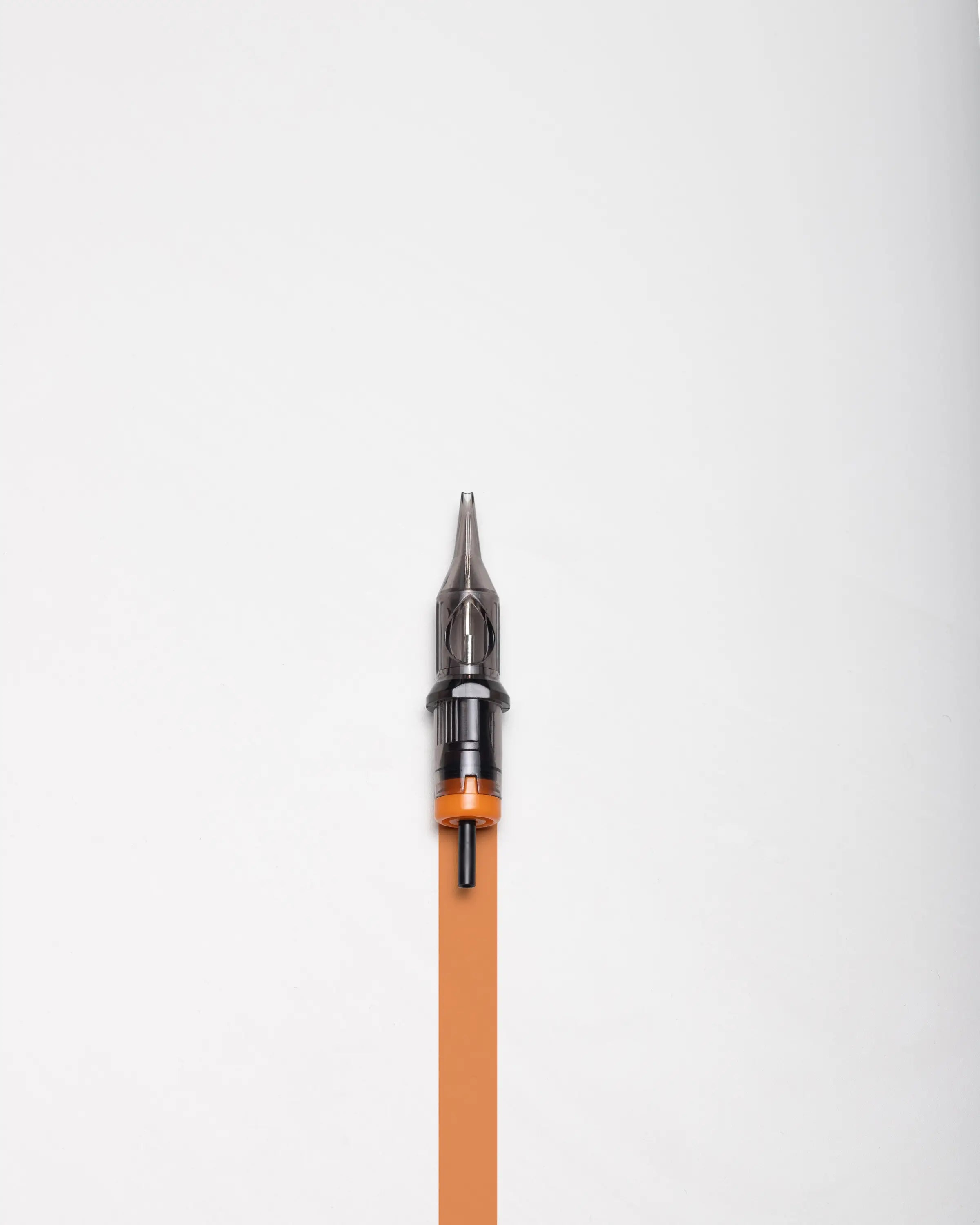 Orange-tipped blaze cartridges round shader tattoo needle with black and transparent metallic tip for shading use