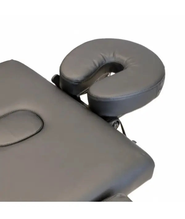 Black padded headrest made of leather for caos nero rental massage table shown from the back side