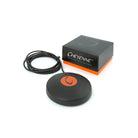 Black circular footswitch with orange power button by Cheyenne professional tattoo equipment for precise control