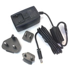 Blackes Reiseadapter-Set aus Kunststoff mit mehreren internationalen Steckaufsätzen und spiralförmigem Netzkabel CHEYENNE Wandnetzteil PU I II Hawk und Sol