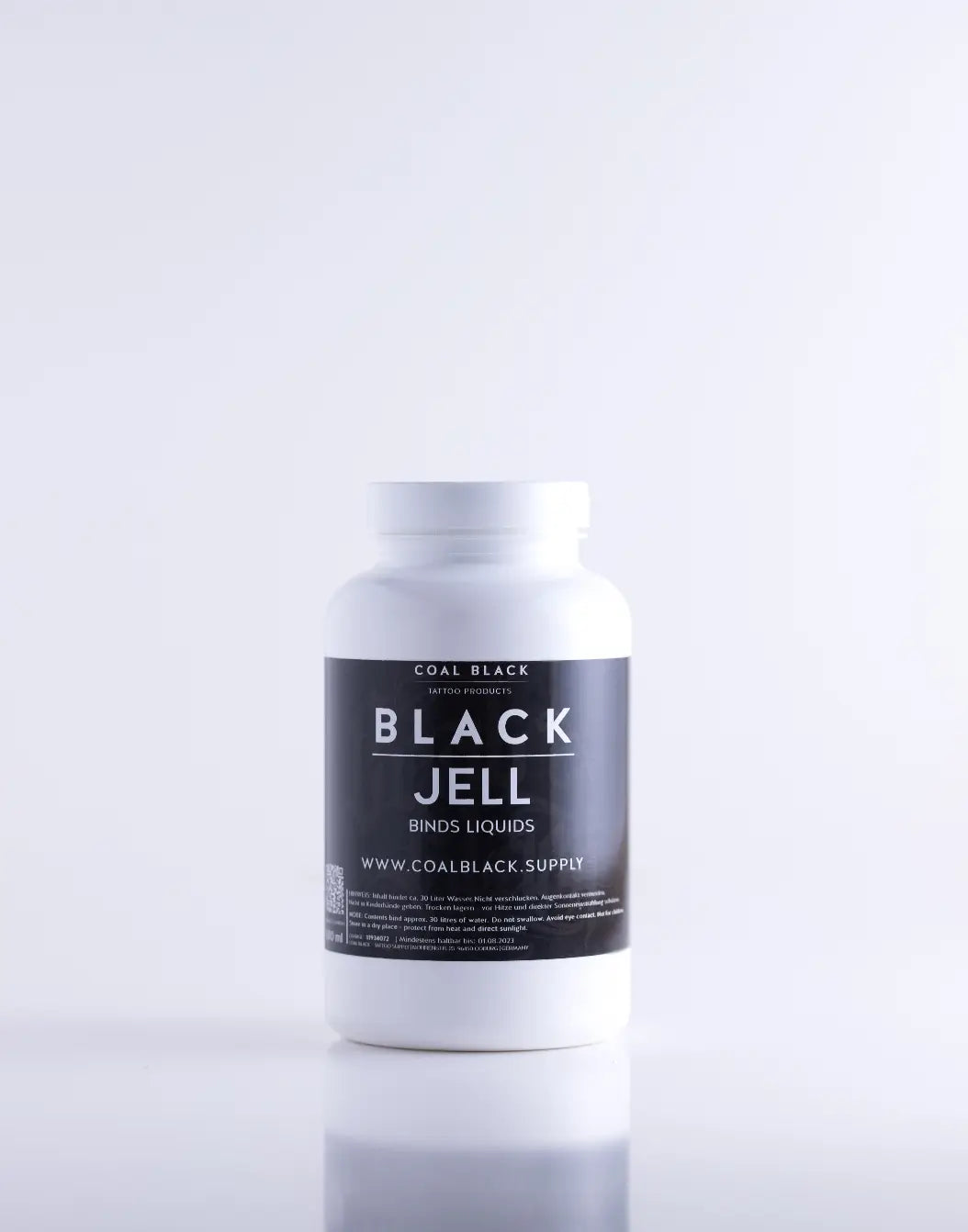 White plastic bottle with black label featuring coal black artified black jell product for coloring or coating use