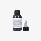 Dark grey artist pigment in sleek black dermaglo uk ltd bottle with matching cap and separate dropper tip