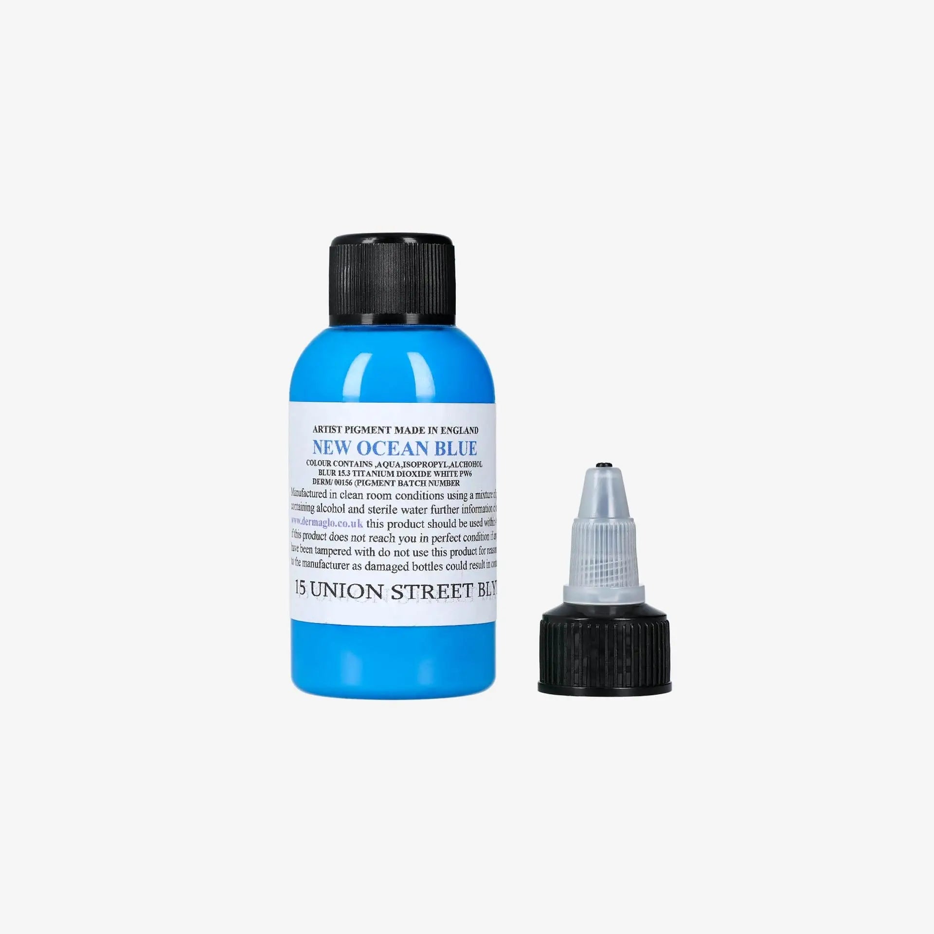 Bright blue artist pigment bottle with black cap labeled new ocean blue from 15 Union Street Dermaglo product