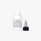 White artist pigment bottle with black dropper cap labeled white by dermaglo uk ltd in dermaglo white product