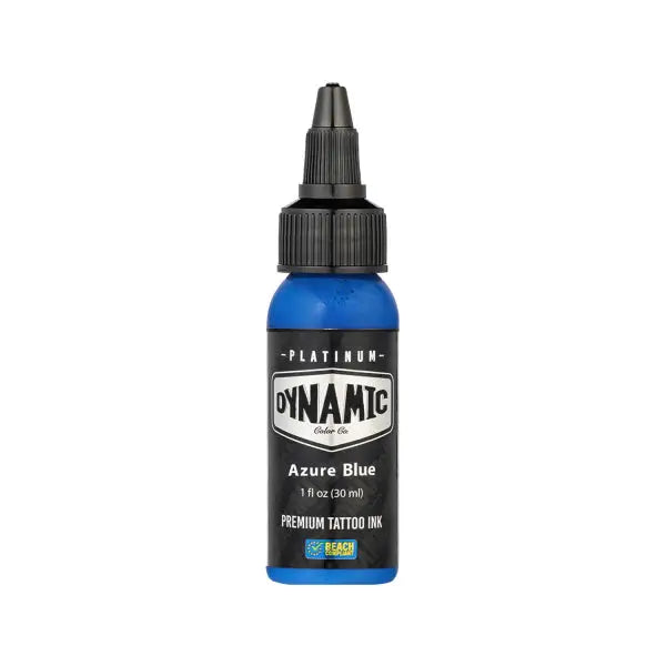 A vibrant blue plastic bottle of dynamic platinum azure blue premium tattoo ink with a black screw-on cap and label