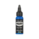 A vibrant blue plastic bottle of dynamic platinum azure blue premium tattoo ink with a black screw-on cap and label