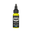 A vibrant bottle of colore tattoo neon green with black cap from dynamic platinum earth set 5x30 ml