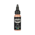 A sleek black bottle of dynamic tattoo ink in skin shade with a matte finish and precision dropper cap from platinum flesh set