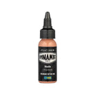 A sleek black-topped bottle of Dynamic tattoo ink in nude shade with glossy peach liquid and bold white branding