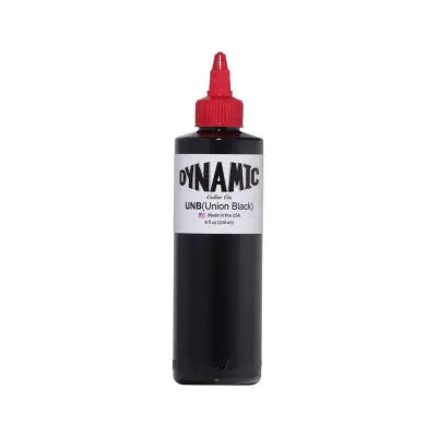 Black ink bottle with red cap and white label reading dynamic featuring union black ink branding
