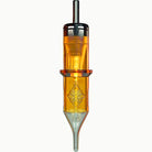 Transparent amber-colored edge pro round shader tattoo needle cartridge with metallic tip and engraved floral design marked 30 on cone