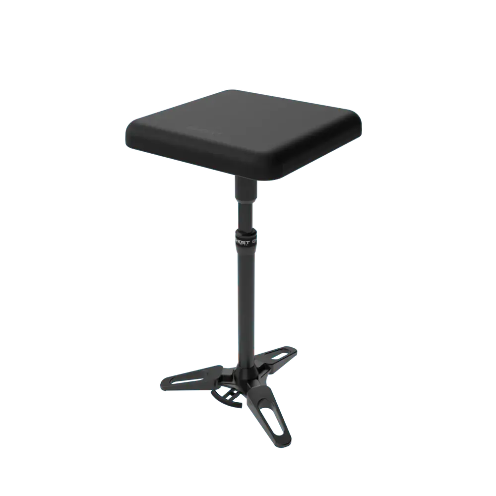 Black padded square stool with height-adjustable metal frame and tripod base for ghost demon arm rest full system