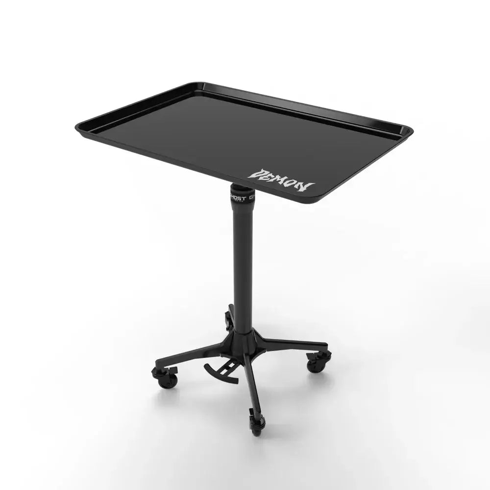 Black matte-finish ghost demon tray full system tray table with sleek modern design and four caster wheels for mobility