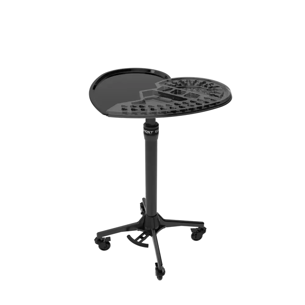 Black ghost gt adjustable-height stool with circular perforated top and caster wheels shown with ghost disposable tray 20pcs