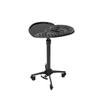 Black ghost gt adjustable-height stool with circular perforated top and caster wheels shown with ghost disposable tray 20pcs
