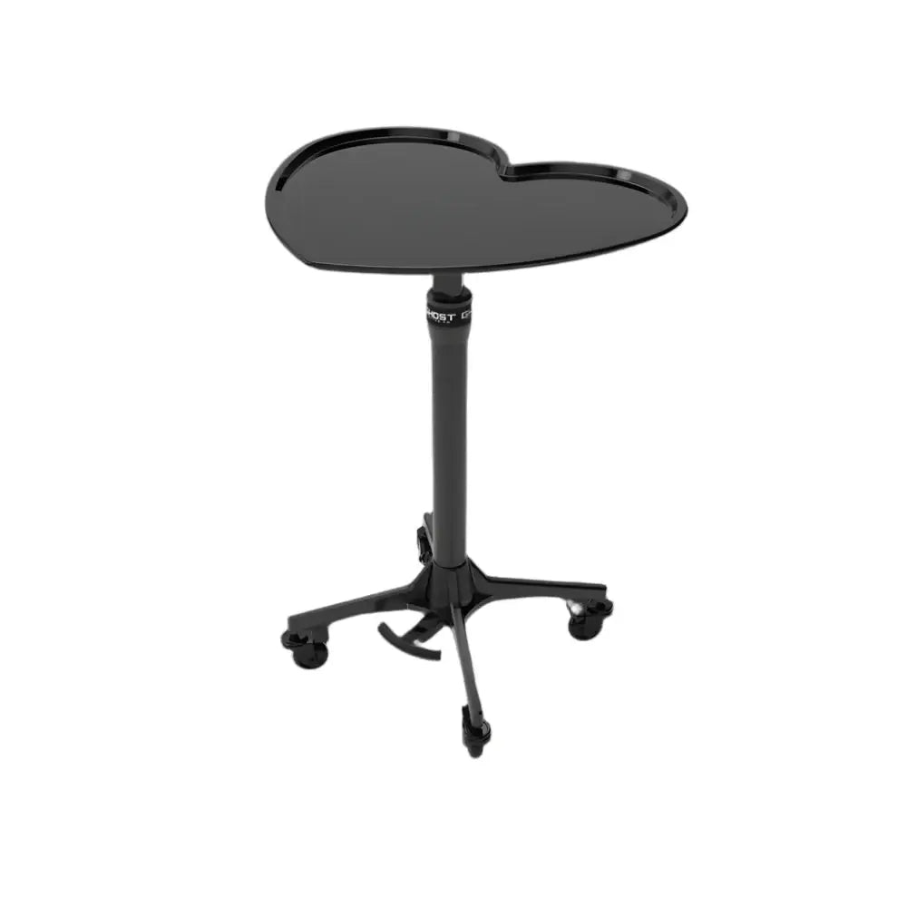 Black heart-shaped ghost tray made of durable material on a mobile stand with casters for easy movement