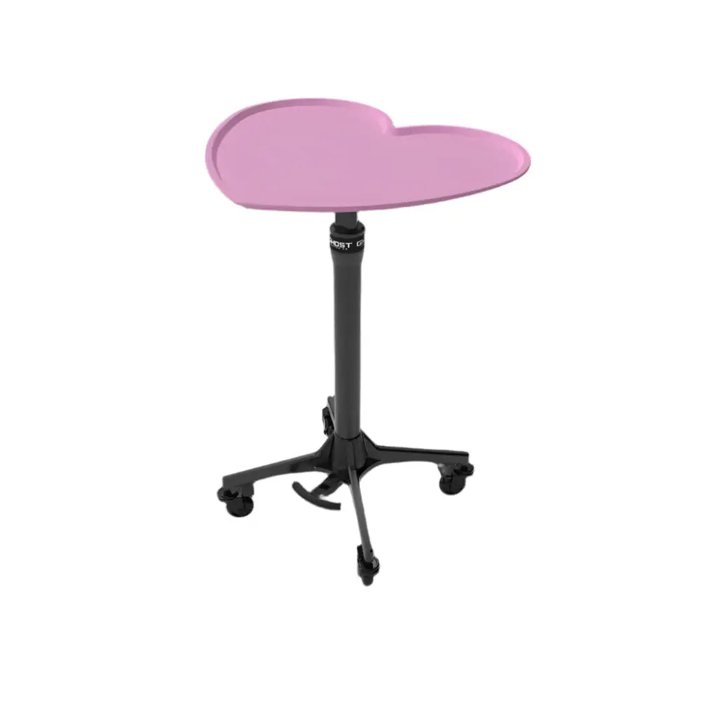 Ghost heart tray full system with pink heart-shaped tabletop on black adjustable pedestal with caster wheels