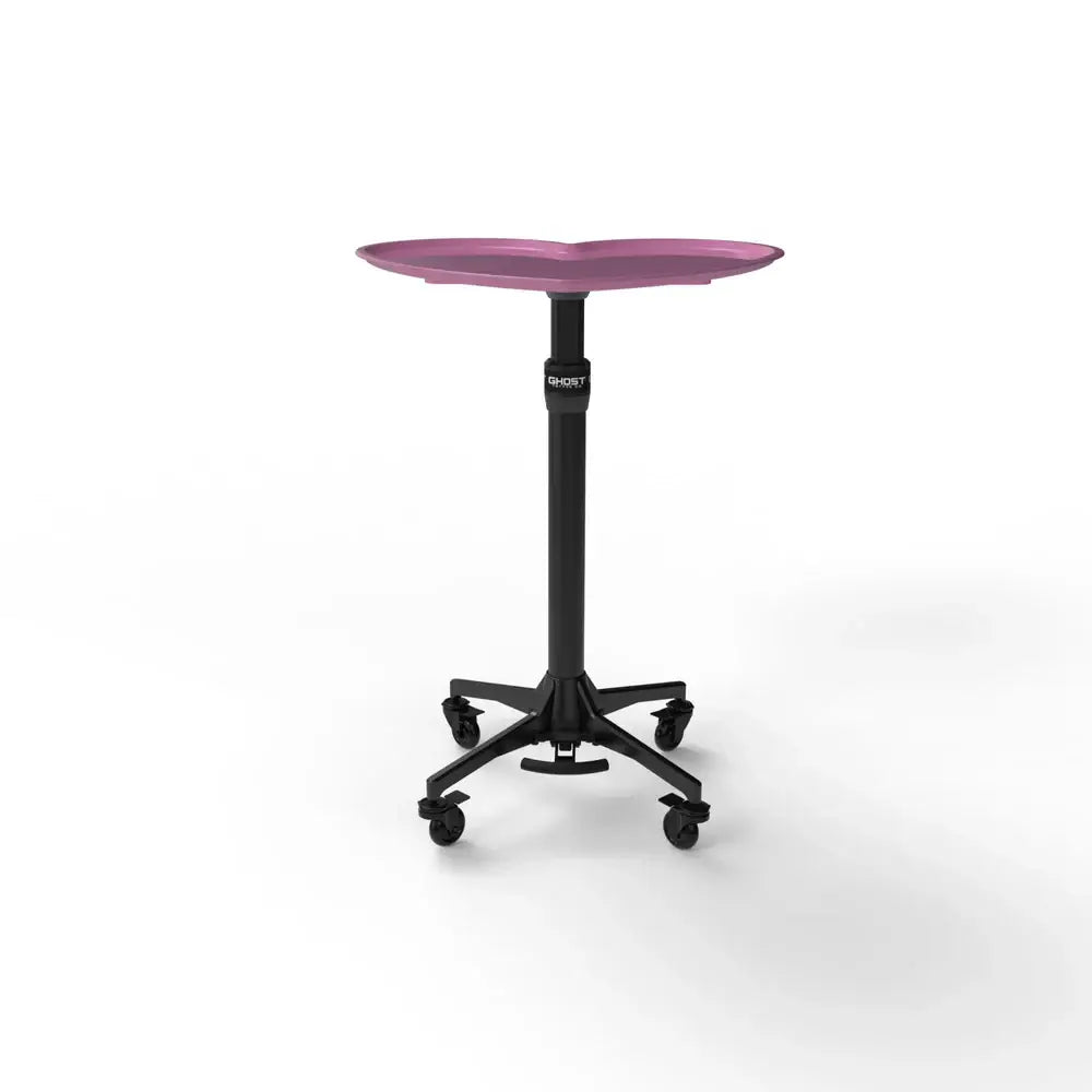 Ghost heart tray full system with a sleek pink heart-shaped tabletop on a black adjustable pedestal with caster wheels
