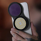 Black circular phone lens attachment with purple filter and led light panel from goat g8 v2 combo product