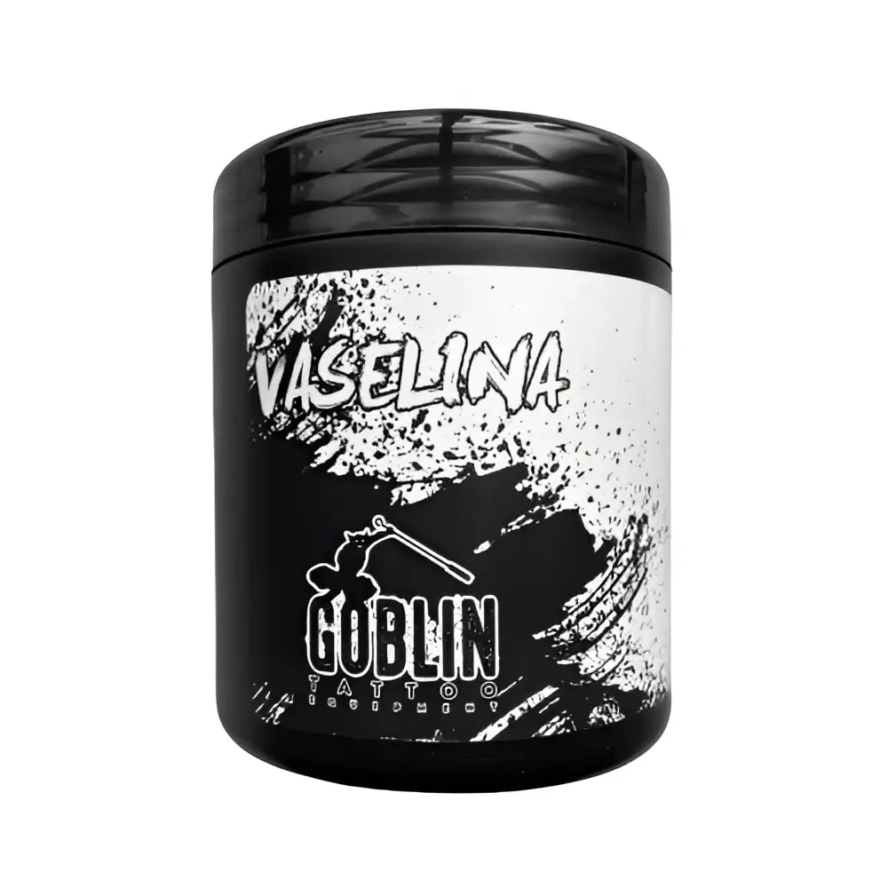 Schwarzer zylindrischer Behälter mit GOBLIN-Tattoo, weißer Vaseline, glänzendem Deckel und auffälligem weißem Graffiti-Branding
