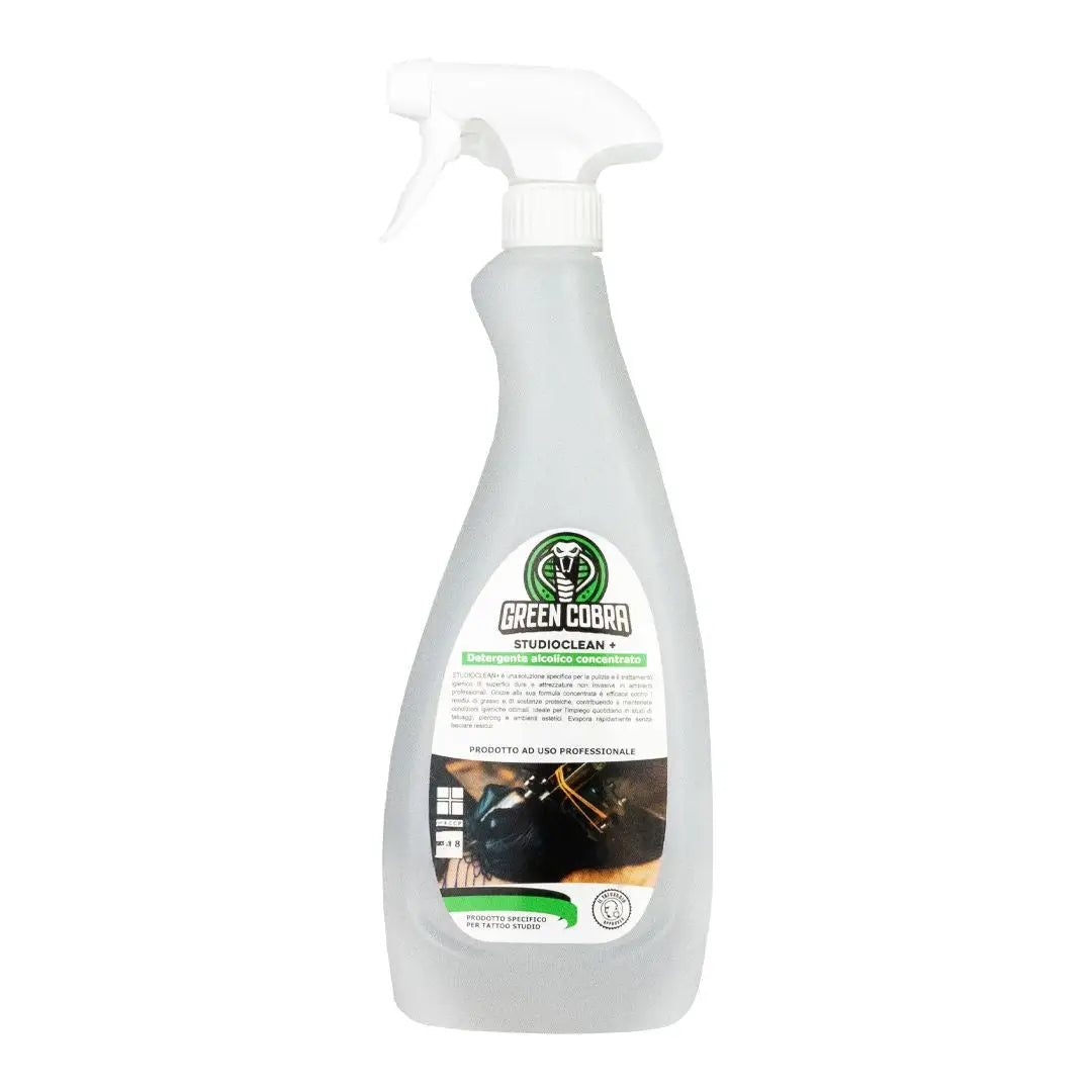 Green cobra studioclean plus transparent spray bottle with white trigger and green label for surface disinfectant