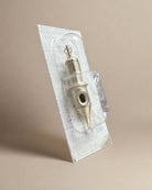 A metallic tattoo needle in clear plastic and white cardboard packaging for grill meister 925 silver cartridge pendants charm