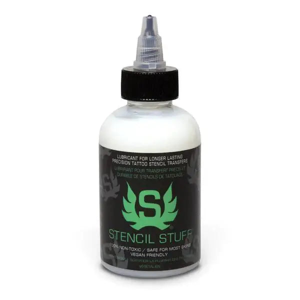 A clear plastic bottle with a black cap and nozzle labeled stencil stuff by INTENZE for stencil application