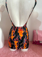 Kalu ibiza flames mini skirt one-piece jumpsuit with black and orange flame pattern and thin straps for vice attitude style