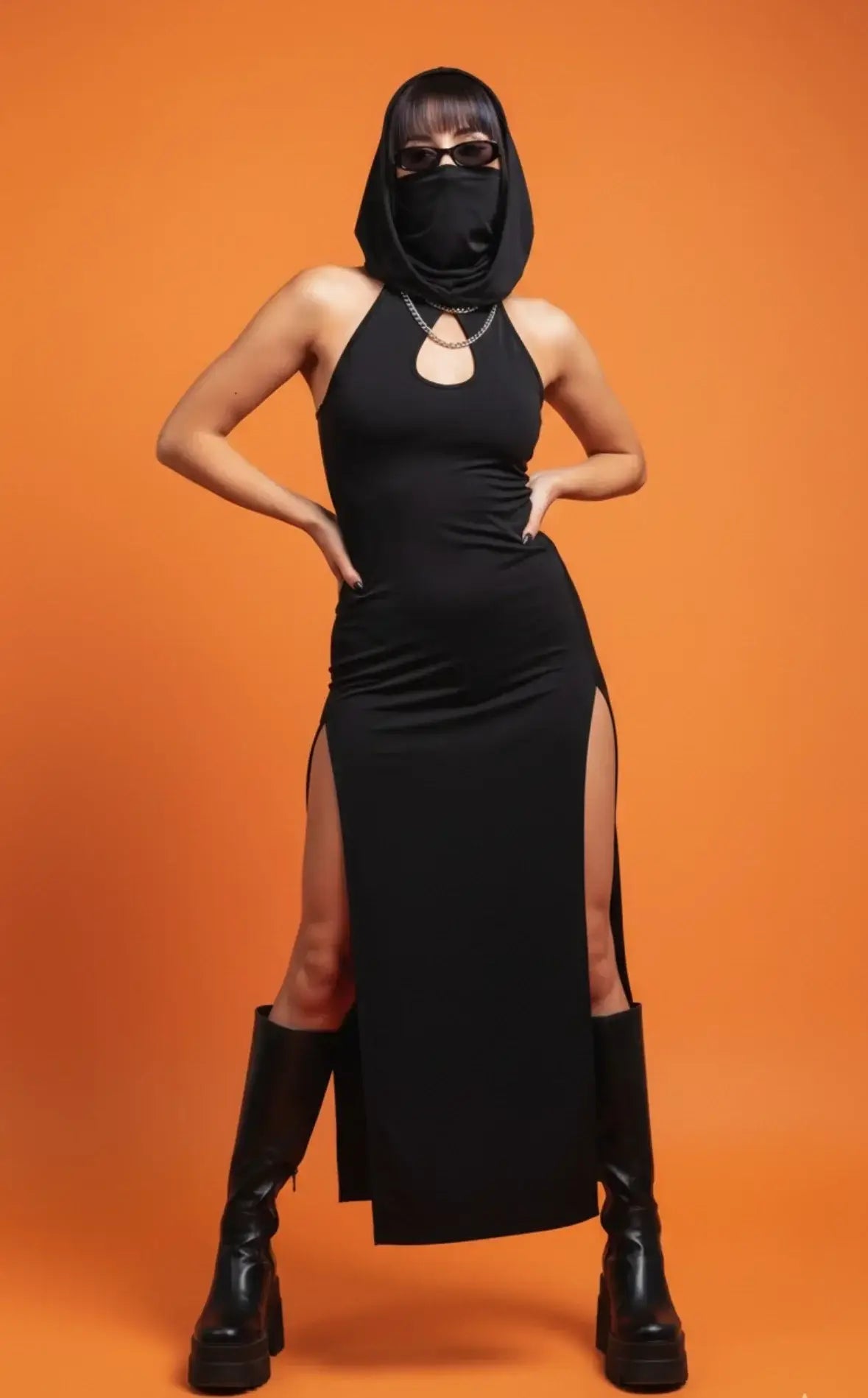 Black high-necked slit dress with hood and cutout neckline from kalu ibiza featuring premium construction and vice attitude