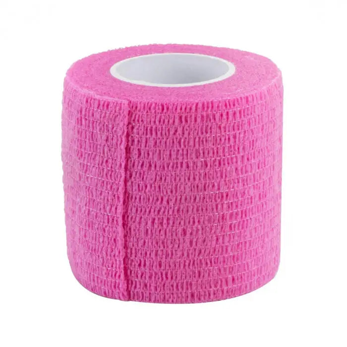 A roll of killer ink grip wrap pink 50mm x 4.5m bright pink textured elastic wrap with a white inner core