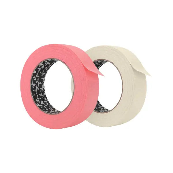 Two rolls of killer ink paper tape in vibrant pink and off white with black patterned inner core for painting tasks