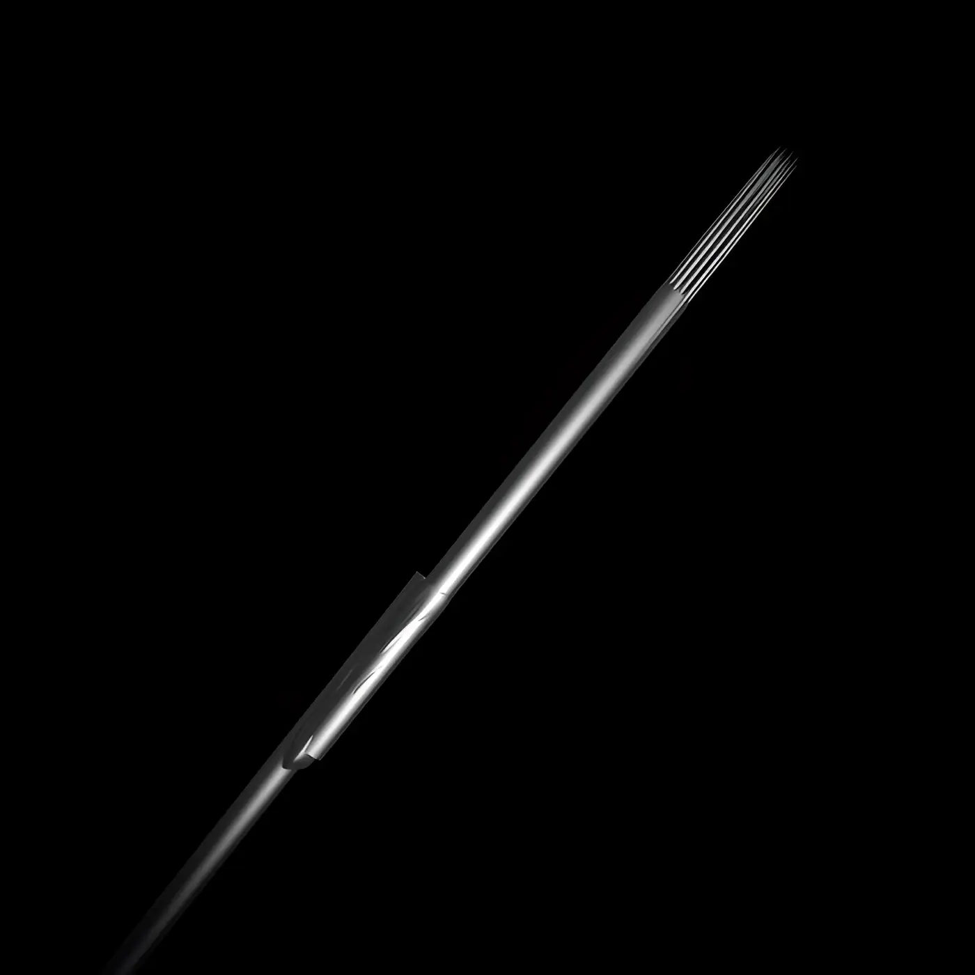 Silver-colored multi-pronged killer ink precision tattoo needles with sleek metallic finish for round shaders