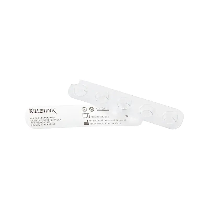 White plastic killer ink sterile disposable ink cap strips pack with clear circular cutouts for tattoo use
